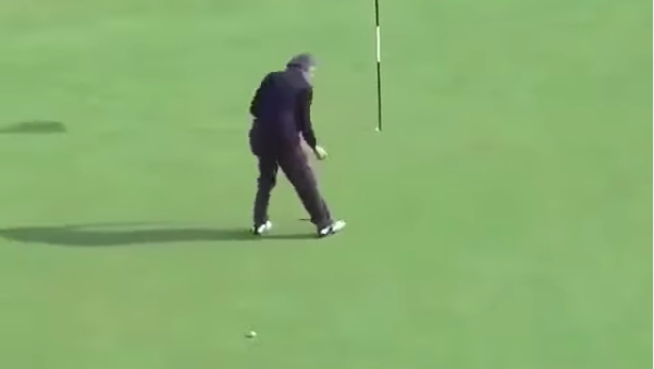 CAN YOU DO THIS ON THE GREEN WHEN A GOLF BALL IS ALREADY IN MOTION?